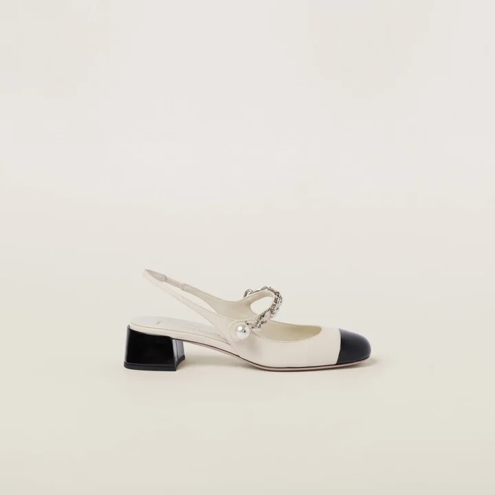 Leather and patent leather slingback pumps - Image 2