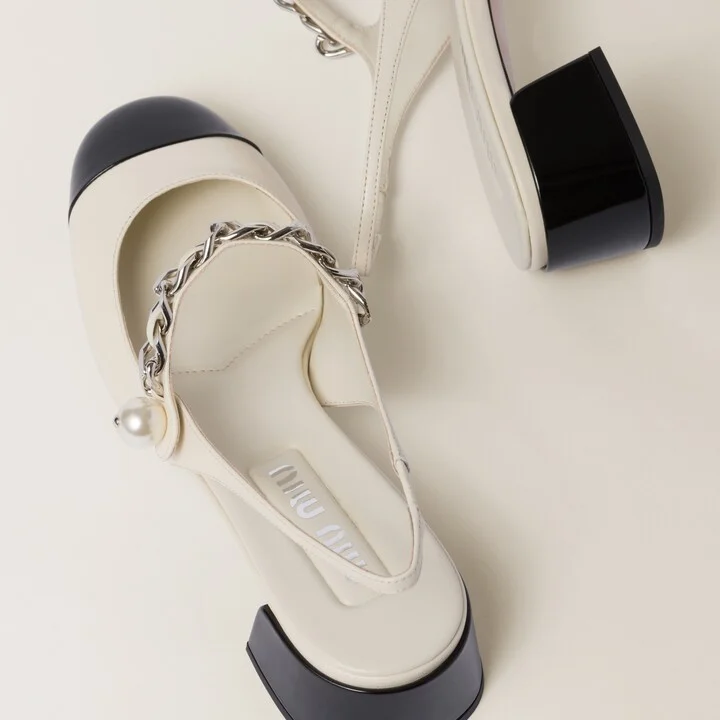 Leather and patent leather slingback pumps - Image 3