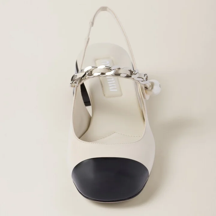 Leather and patent leather slingback pumps - Image 4