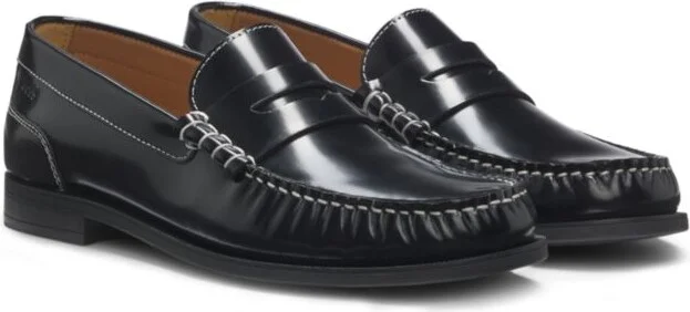 Leather moccasins with penny trim