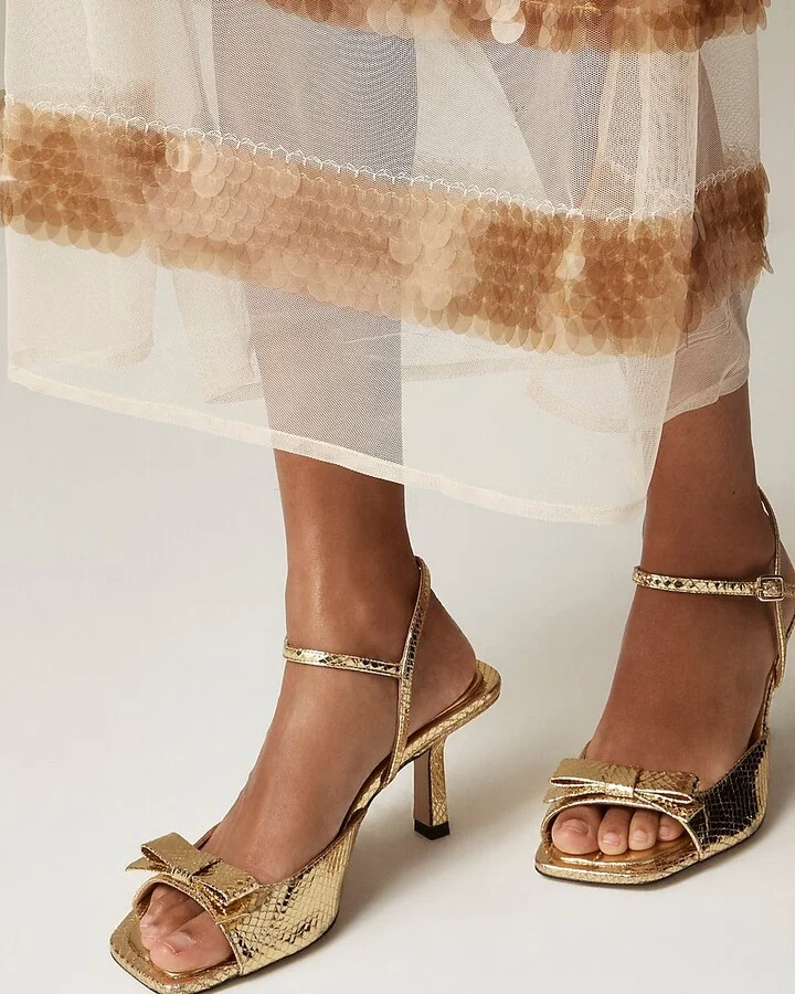 Leni made-in-Spain bow heels in metallic snake-embossed leather
