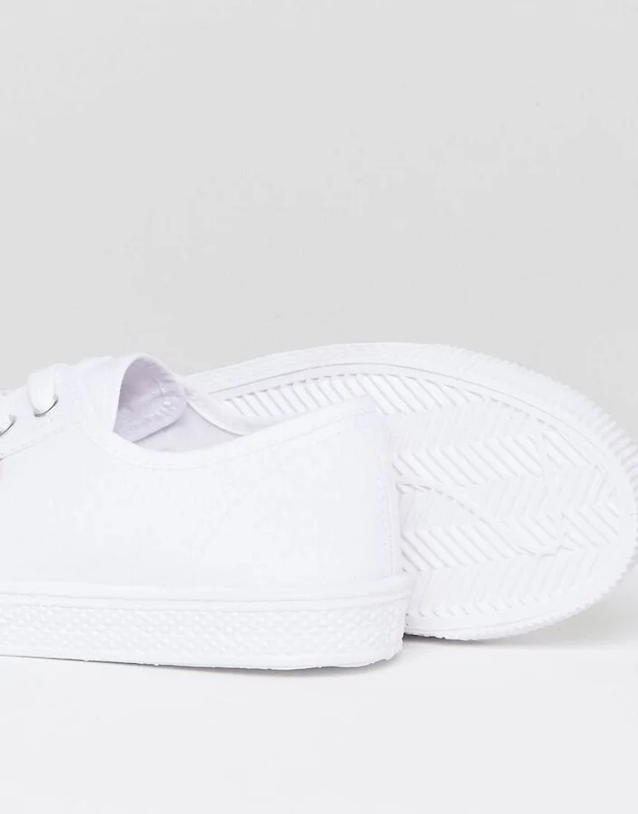 Levi's canvas shoe with red tab in white - Image 4