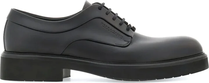 logo-debossed leather Derby shoes