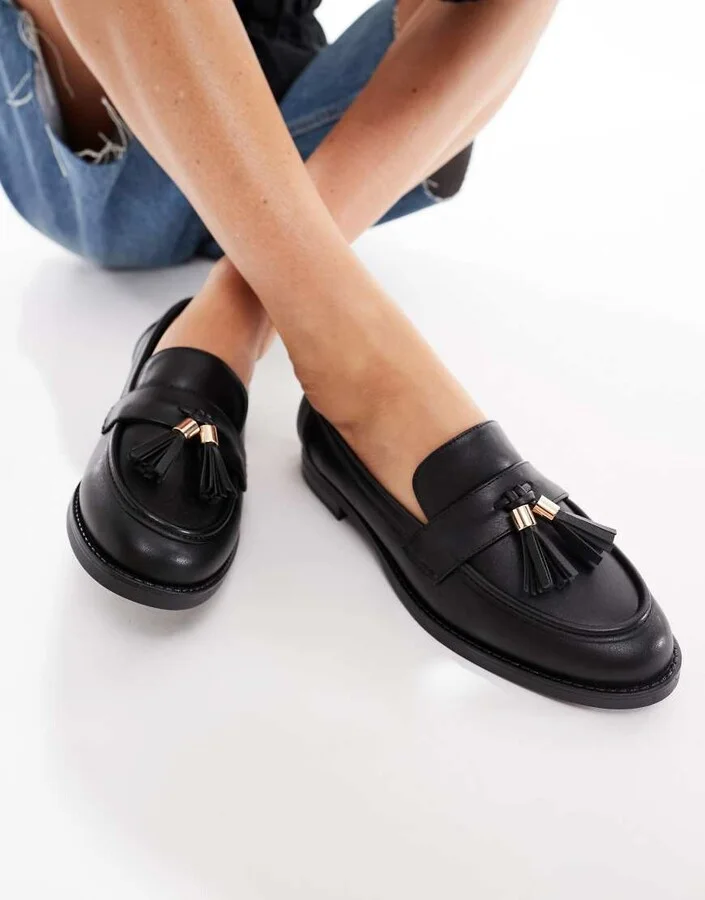 London Rebel Amelia tassel penny loafers in black