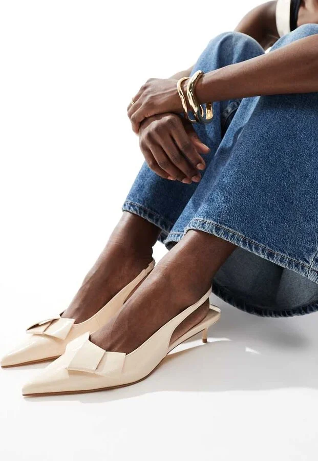 London Rebel bow detail sling back kitten heels in cream patent