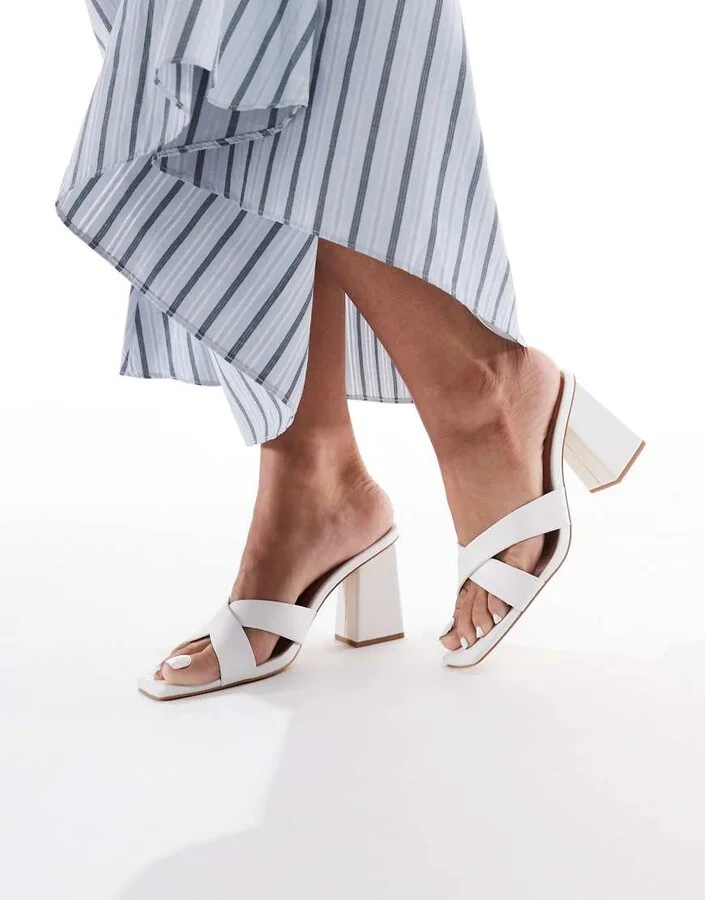 London Rebel crossover detail mules with high heel in white