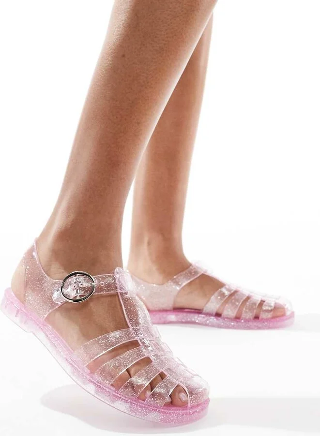 London Rebel Evie flat jelly shoes in pink glitter