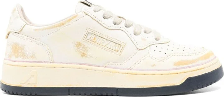 Low-Top Sneakers With Distressed Finish And Perforated Detailing