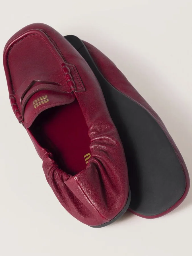 Miu Miu Embossed-Logo Loafers - Image 4