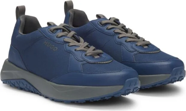 Mixed-material trainers with logo-tape trim