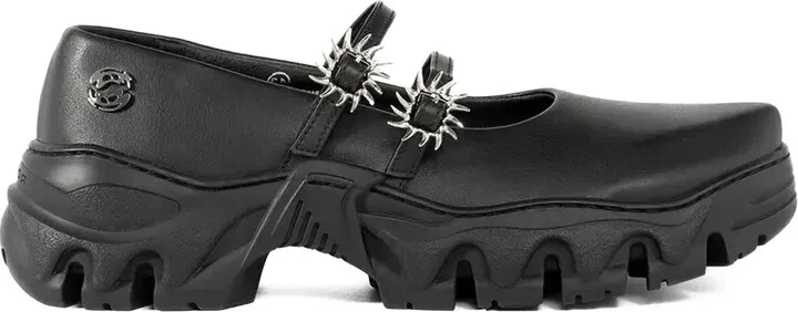 MJ spike-embellished pumps