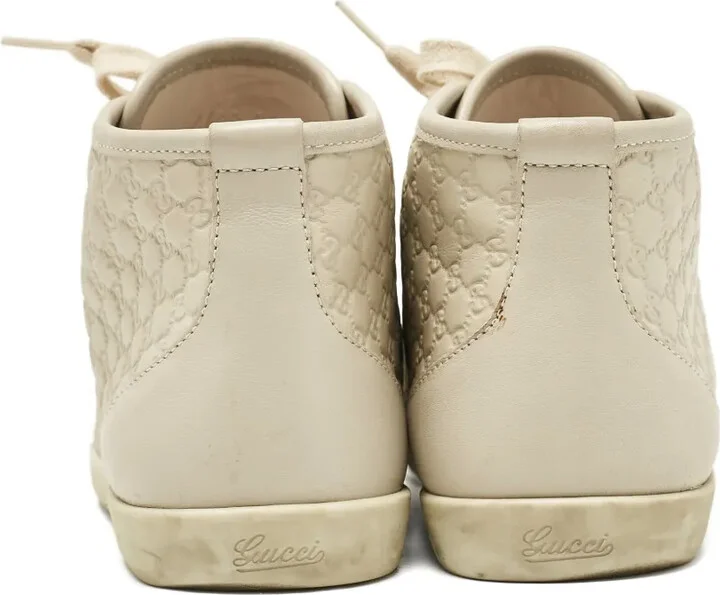 Monogram-Embossed Leather High-Top Sneakers - Image 4