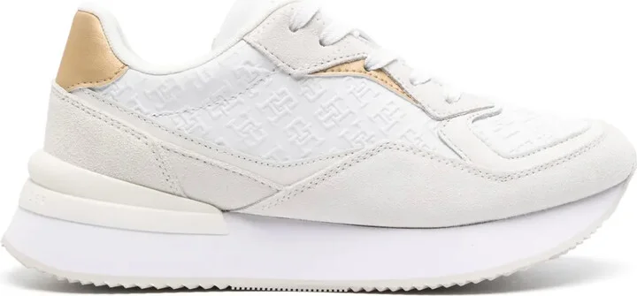 Monogram-Embossed Leather Sneakers