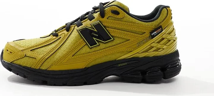 New Balance 1906 sneakers in tan with black details - Image 2