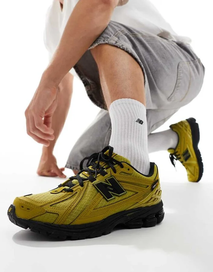 New Balance 1906 sneakers in tan with black details