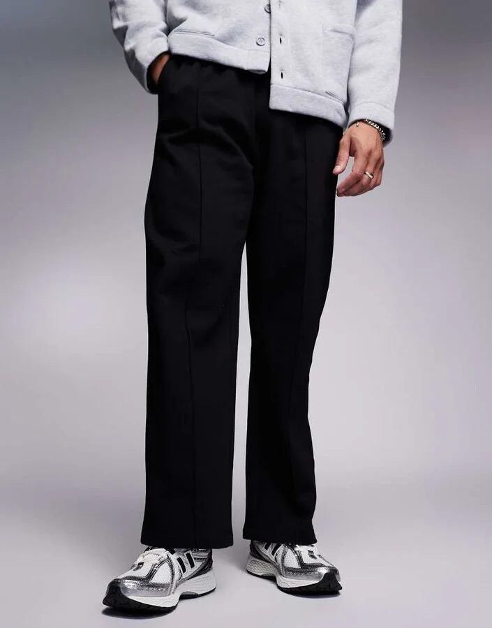 New Balance 1906 sneakers in white with black and silver details - Image 2