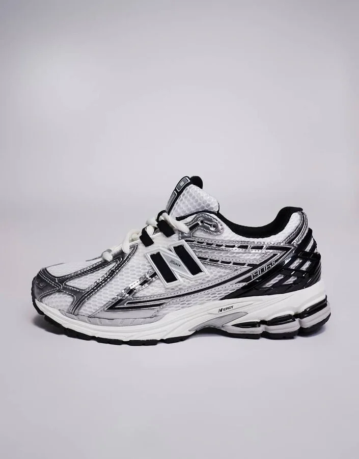 New Balance 1906 sneakers in white with black and silver details