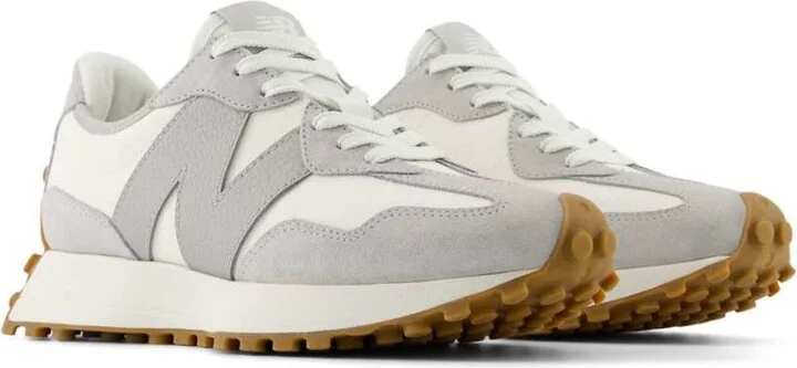 New Balance 327 sneakers in white with gray detail