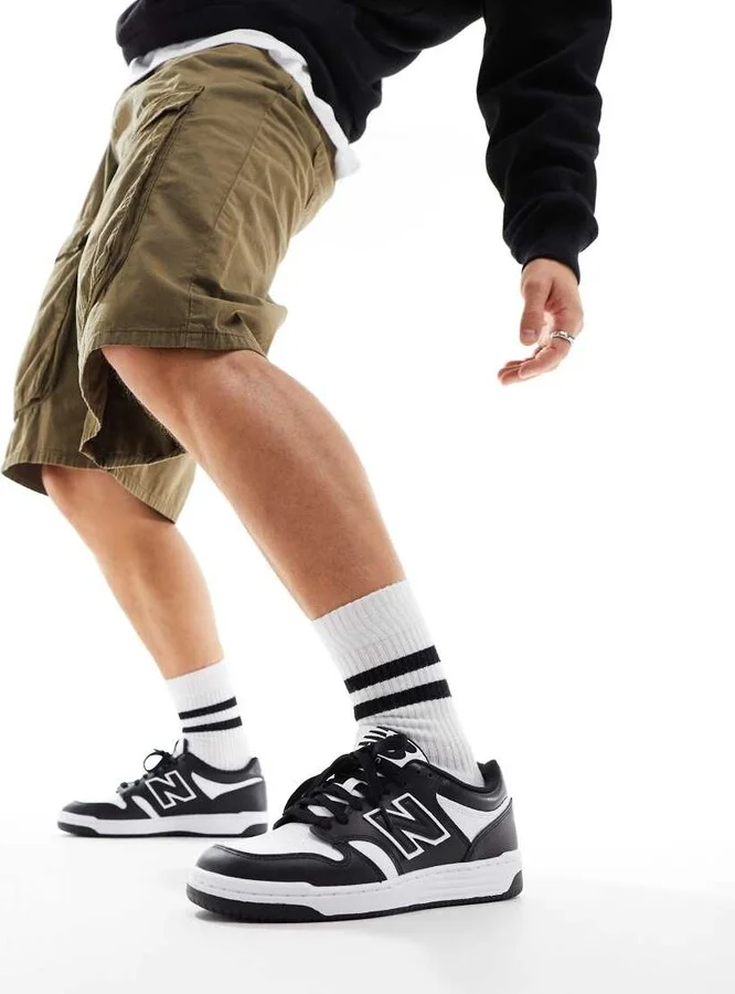 New Balance 480 sneakers in black and white