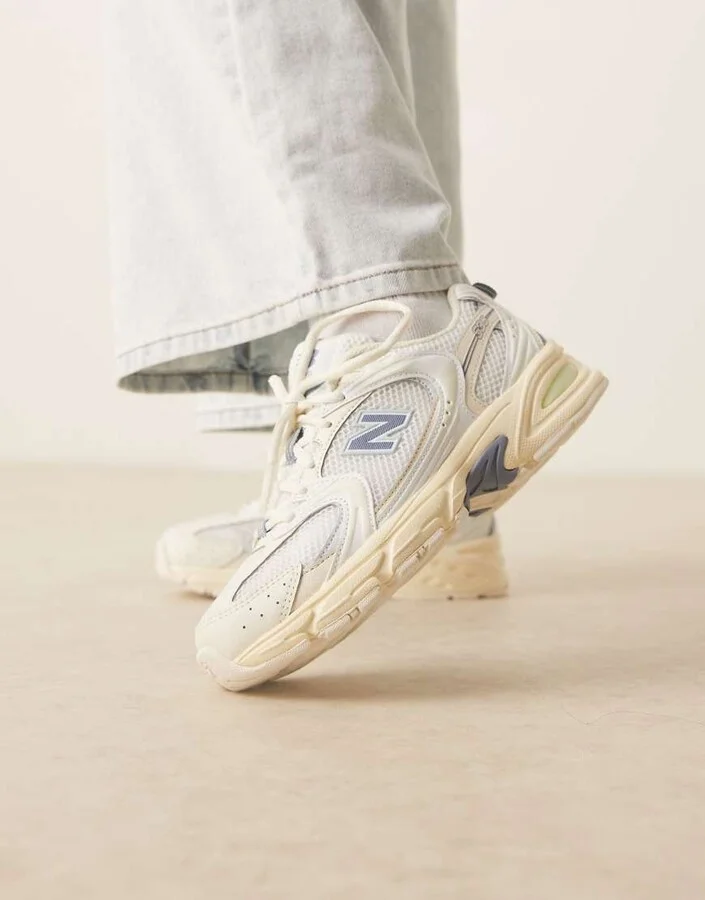 New Balance 530 sneakers in off white and blue detail
