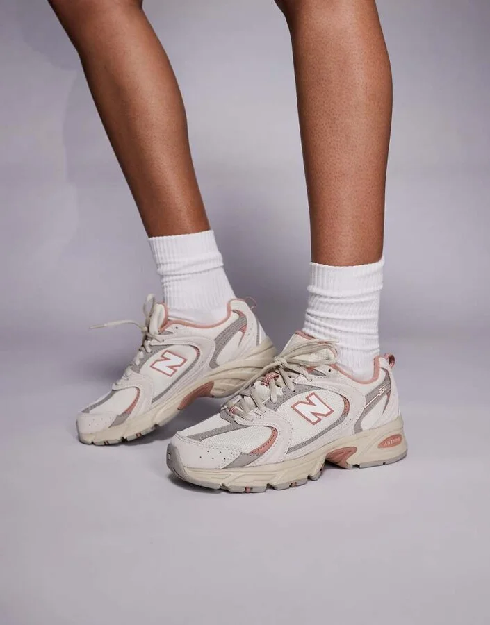 New Balance 530 sneakers in off white and coral