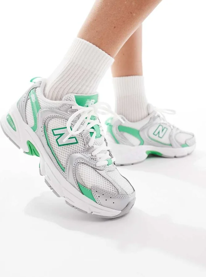 New Balance 530 sneakers in white, silver and green detail
