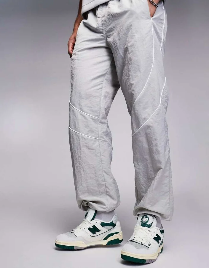 New Balance 550 sneakers in white with green and gray details - Image 4