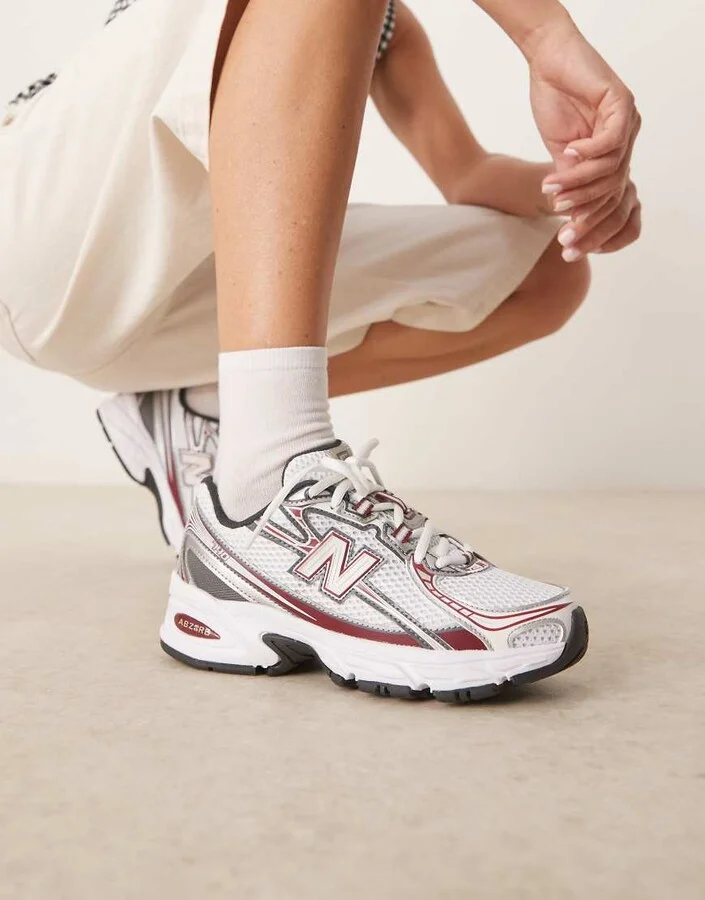 New Balance 740 sneakers in white and red