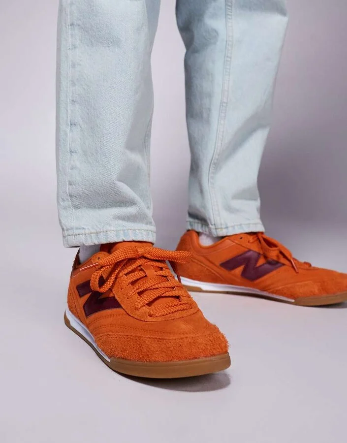 New Balance RC42 gum sole sneakers in orange and purple