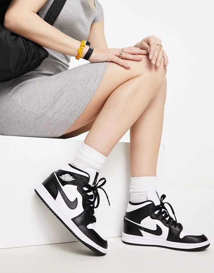 Nike Air Jordan 1 Mid sneakers in white and black
