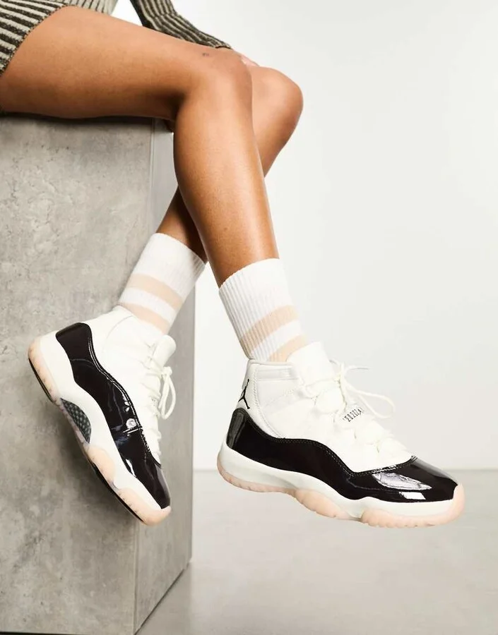 Nike Air Jordan 11 Retro sneakers in off white and brown