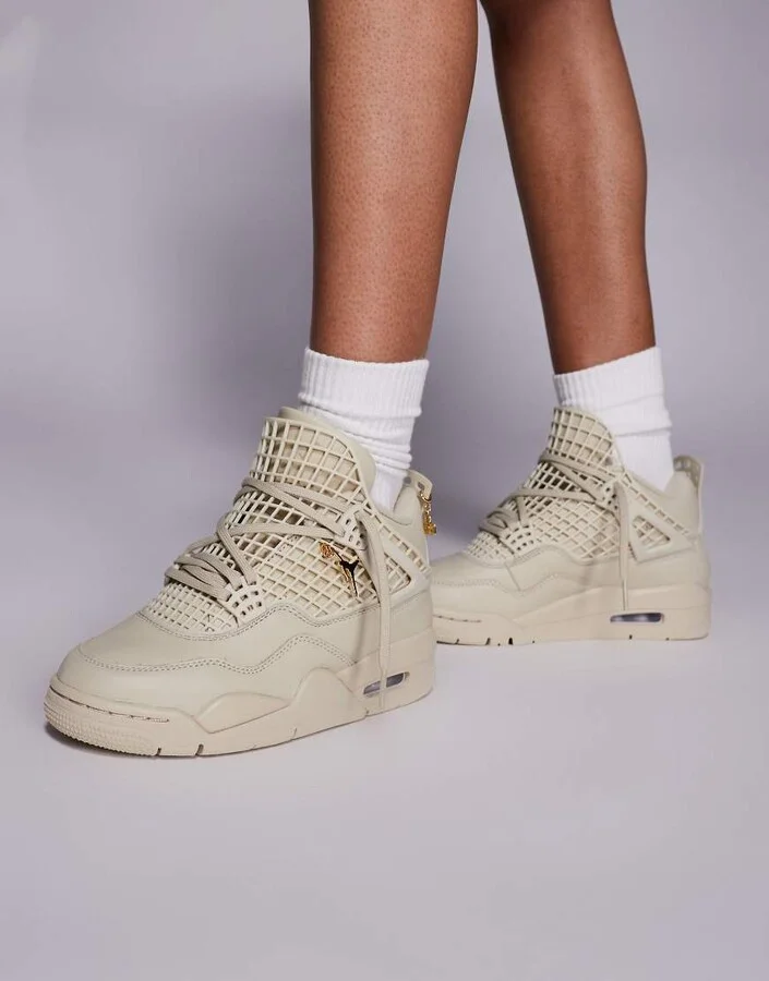 Nike Air Jordan 4 Net sneakers in metallic and gold