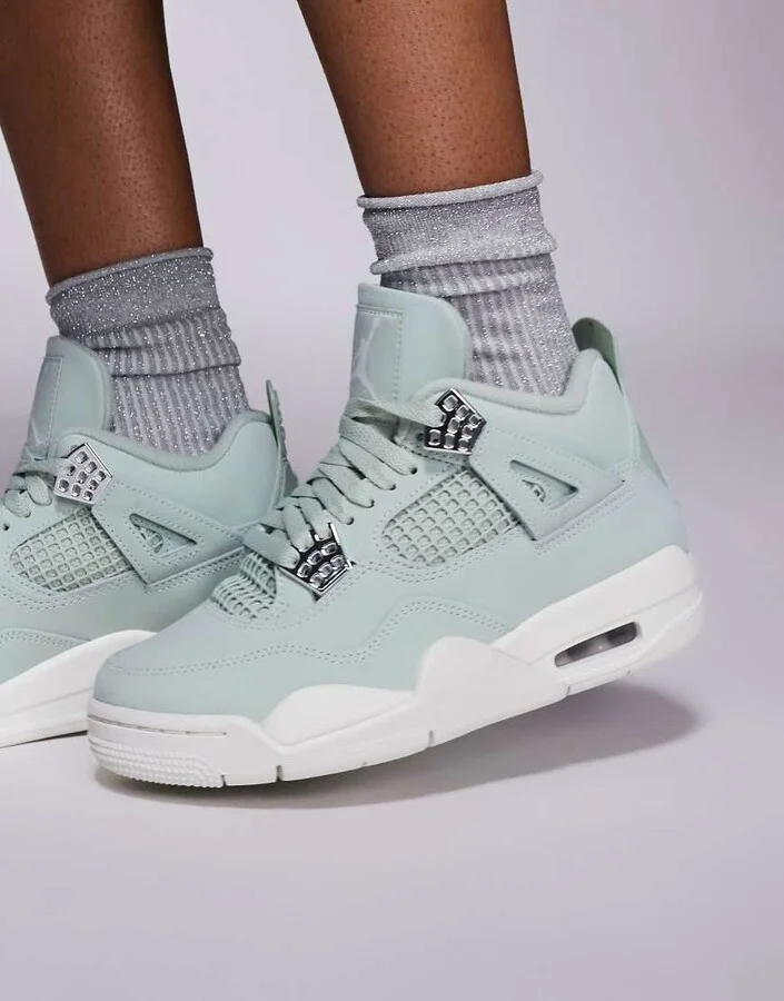 Nike Air Jordan 4 Retro sneakers in light green and white