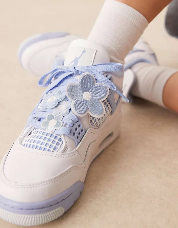 Nike Air Jordan 4 Retro sneakers in white and light blue - Image 4