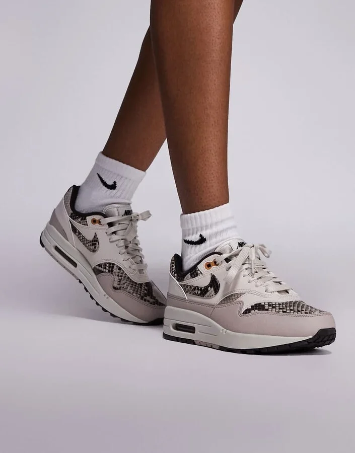 Nike Air Max 1 sneakers in white and snake print