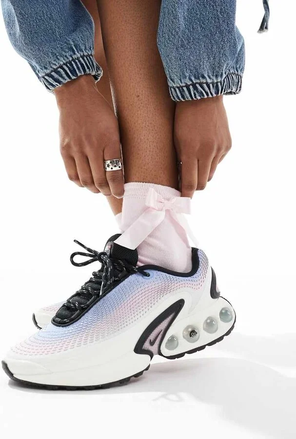 Nike Air Max DN sneakers in white and pink