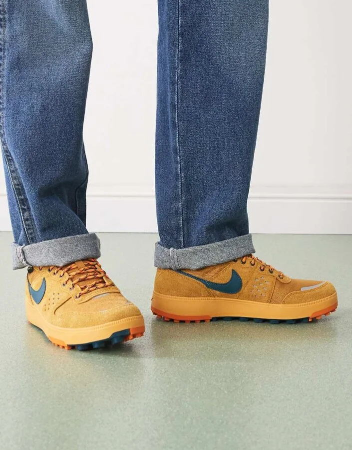 Nike C1ty sneakers in beige and orange