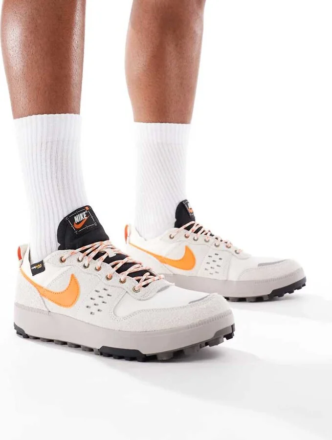 Nike C1TY sneakers in off-white and orange