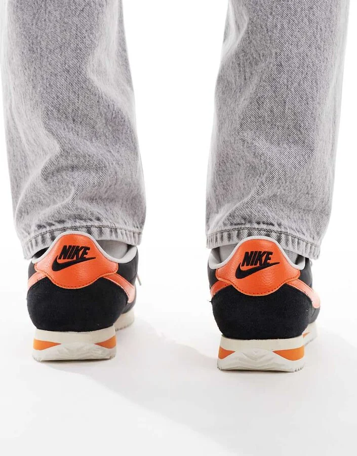 Nike Cortez sneakers in black and orange - Image 3