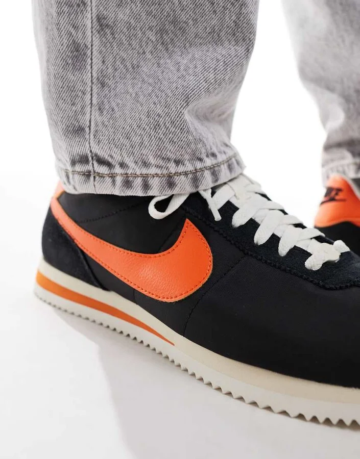 Nike Cortez sneakers in black and orange - Image 4