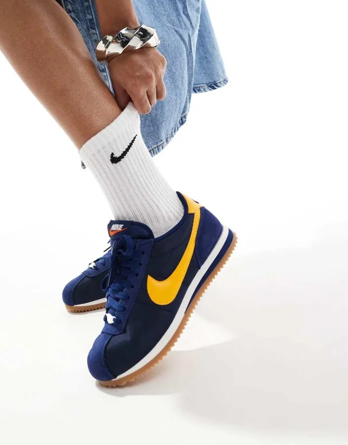 Nike Cortez sneakers in navy and yellow