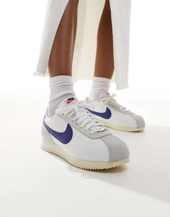 Nike Cortez Textile sneakers in white and blue