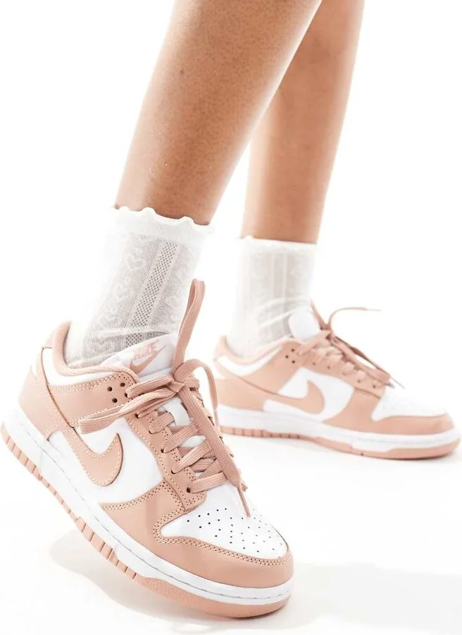 Nike Dunk Low sneakers in white and pink