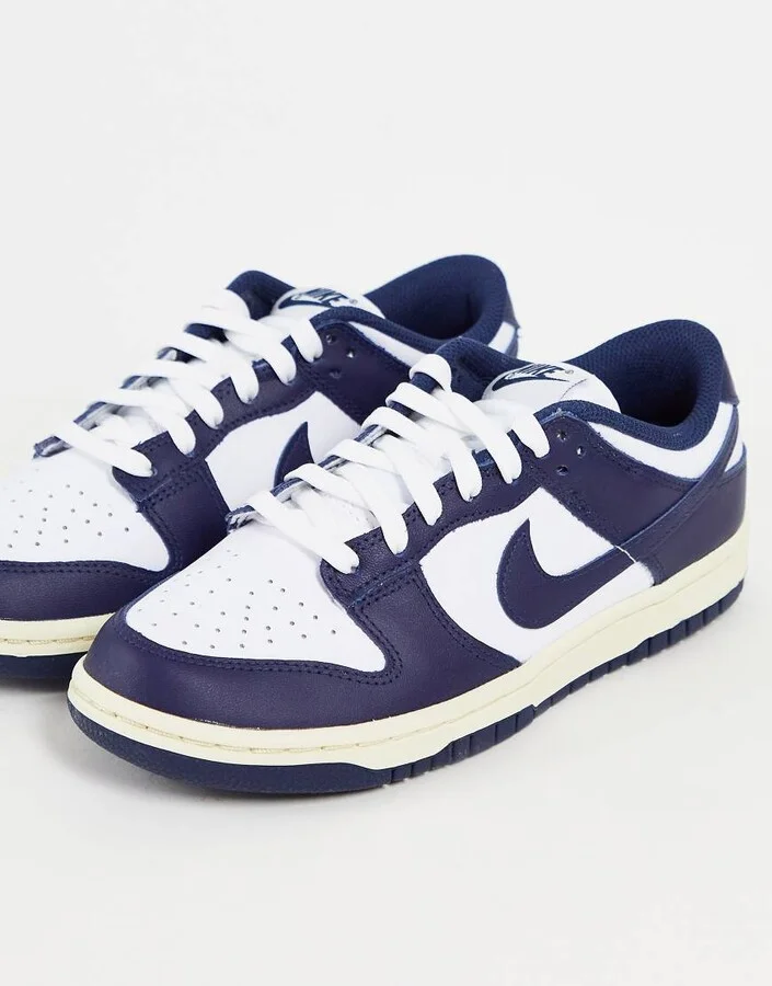 Nike Dunk Low sneakers in white/midnight navy