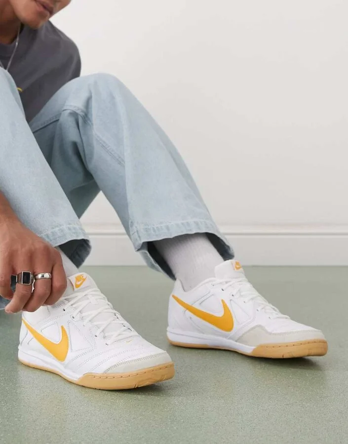 Nike Gato sneakers in white and gold