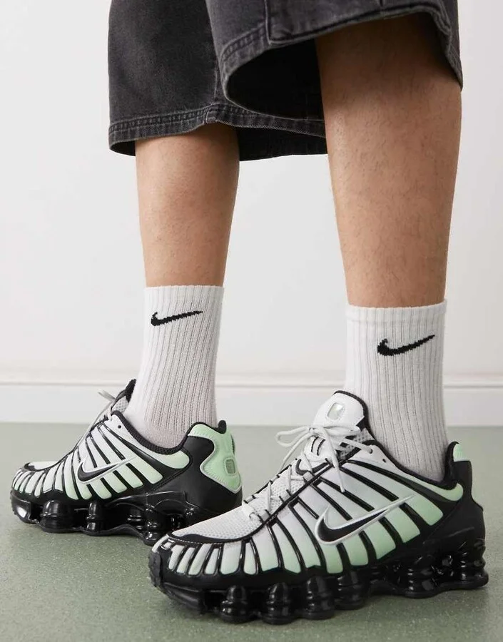 Nike Shox TL sneakers in black and green