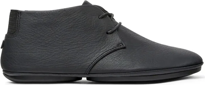 Nina asymmetric-toe leather boots