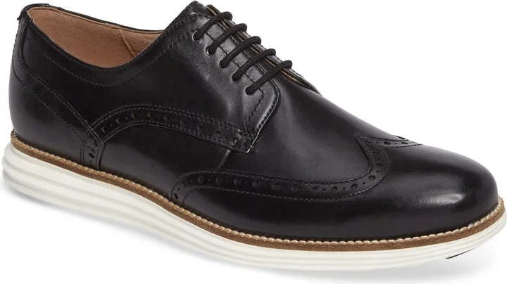 BLACK/ WHITE LEATHER