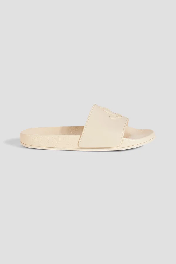 Port embossed rubber slides