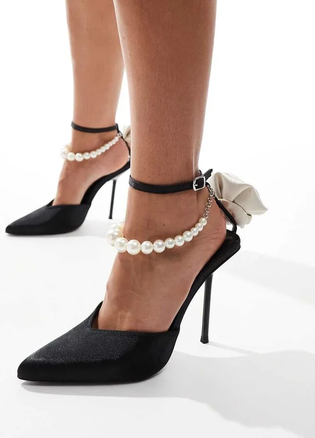 Public Desire Sariah pointed heels in black with pearl ankle strap and corsage detail